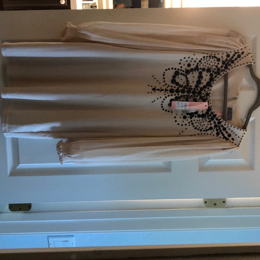 Short off white dress with black beading